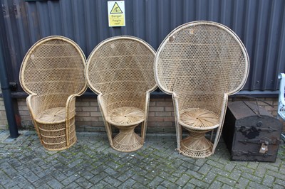 Lot 1402 - Three various wicker peacock chairs