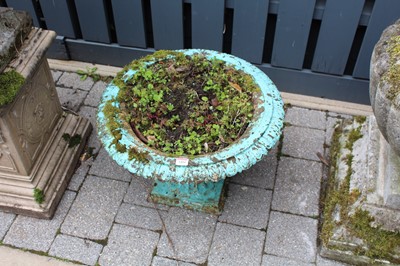 Lot 1404 - A painted cast iron squat pedestal planter, in...