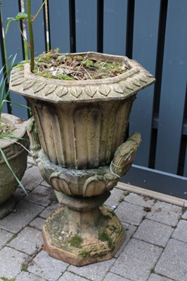 Lot 1406 - A terracotta twin handled pedestal garden urn,...