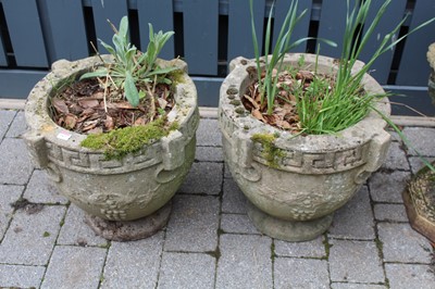 Lot 1407 - A pair of reconstituted stone circular...