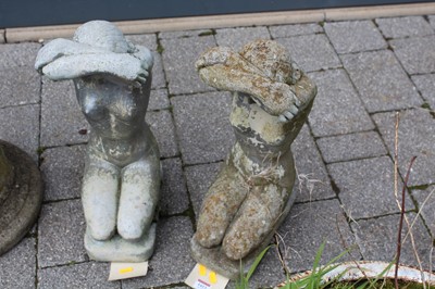 Lot 1413 - A pair of reconstituted stone garden figures...