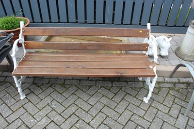 Lot 1416 - A white painted cast iron ended and hardwood...