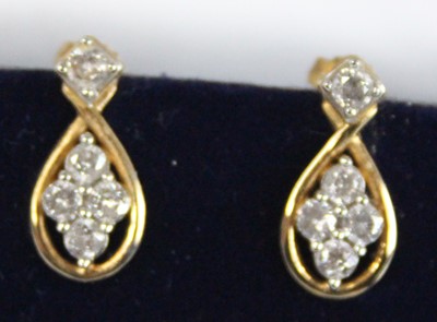 Lot 2623 - A pair of yellow and white metal diamond drop...