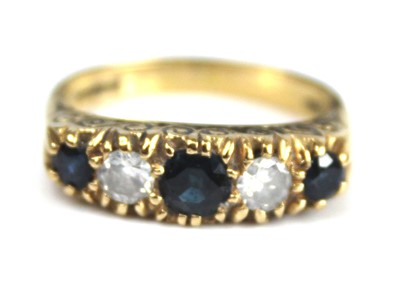 Lot 2690 - An 18ct yellow gold, sapphire and diamond half...