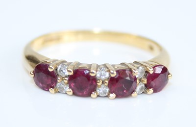 Lot 2691 - An 18ct yellow gold, ruby and diamond half...