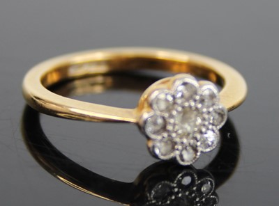 Lot 2871 - An 18ct gold diamond flower head cluster ring,...