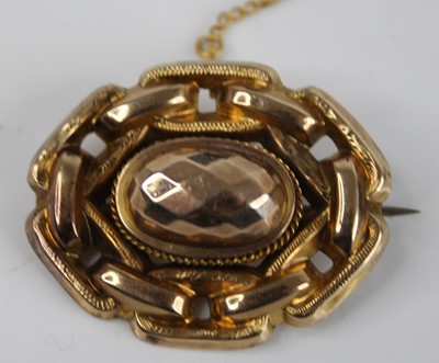 Lot 2786 - A Victorian yellow metal boss shape oval...