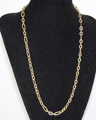 Lot 2728 - A modern 9ct gold textured oval link necklace,...