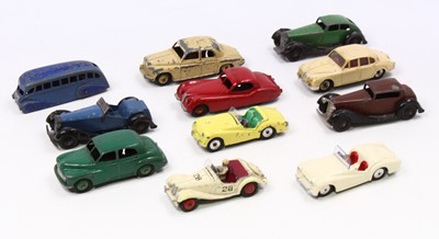 Lot 1562 - Dinky toys group of eleven loose and playworn...