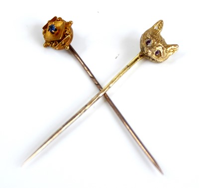 Lot 2442 - A 15ct gold round cut sapphire set tie-pin,...