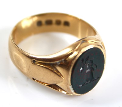 Lot 2416 - An 18ct gold and bloodstone set gent's signet...