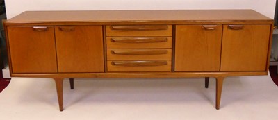 Lot 353 - A 1960s Danish teak long sideboard by A....