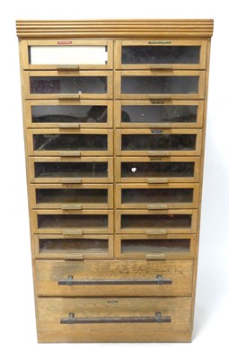 Lot 345 - A 1930s light oak and plywood haberdashery...