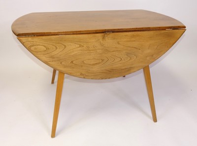 Lot 390 - A 1960s Ercol blond elm Windsor 'Model 384'...