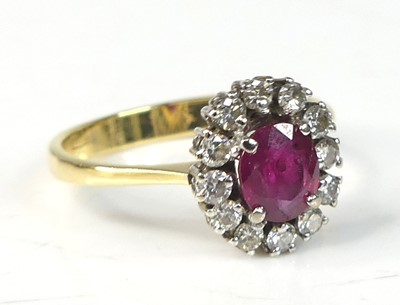 Lot 2420 - An 18ct yellow and white gold, ruby and...