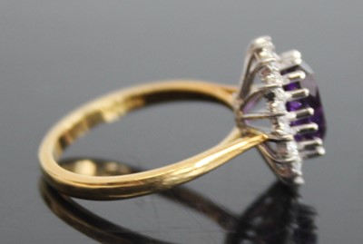 Lot 2484 - A contemporary 18ct gold, amethyst and diamond...
