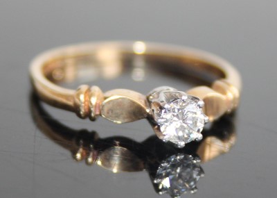 Lot 2456 - A 9ct gold diamond solitaire ring, the claw...