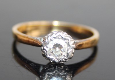 Lot 2435 - An 18ct gold diamond solitaire ring, the...