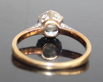 Lot 2435 - An 18ct gold diamond solitaire ring, the...