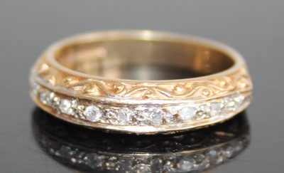 Lot 2815 - A 9ct gold diamond half eternity ring,...