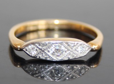 Lot 2817 - An Art Deco 18ct gold diamond three-stone ring,...