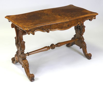 Lot 2483 - A Victorian figured walnut centre table, of...