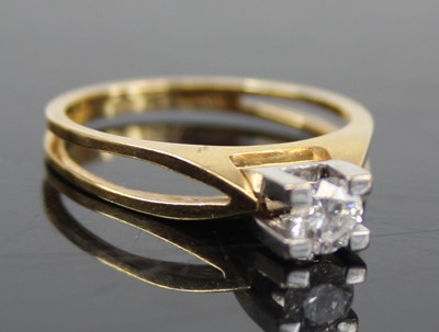 Lot 2460 - A contemporary 18ct gold diamond solitaire...