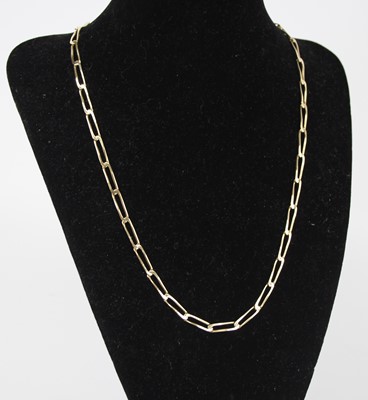 Lot 2475 - A modern 9ct gold trombone link necklace,...