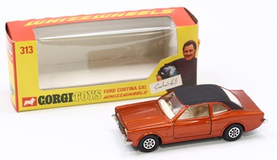 Lot 1425 - Corgi Toys No. 313, Ford Cortina in bronze and...