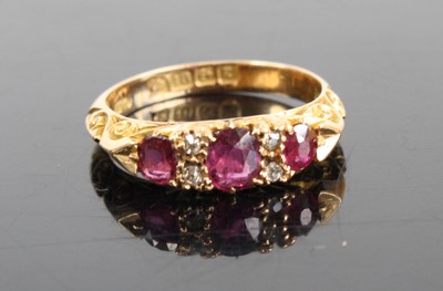Lot 2488 - An Edwardian ruby & diamond half hoop ring,...