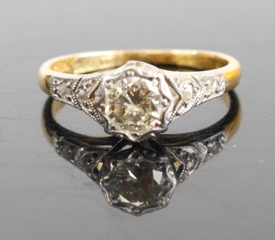 Lot 2799 - An 18ct gold diamond solitaire ring, the...