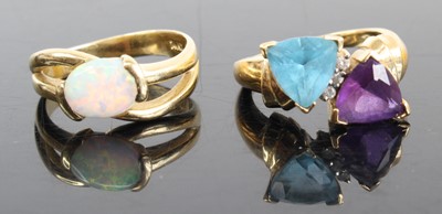 Lot 2804 - A modern 14ct gold and opal cabochon set dress...