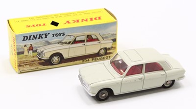 Lot 1253 - French Dinky Toys, 510 Peugeot 204, pale ivory...