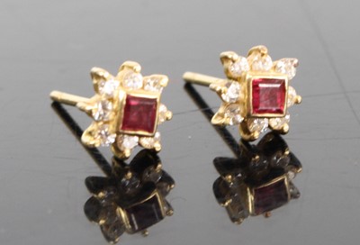 Lot 2877 - A pair of yellow metal ruby and white stone...