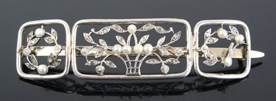 Lot 2883 - An Art Deco white metal seed pearl and diamond...