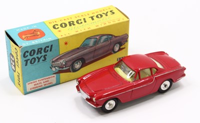 Lot 1462 - Corgi Toys, 228 Volvo P.1800 with red body,...