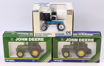 Lot 2112 - Three boxed 1/32 scale models to include ERTL...