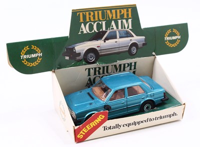 Lot 1196 - A Corgi Toys promotional Triumph Acclaim...