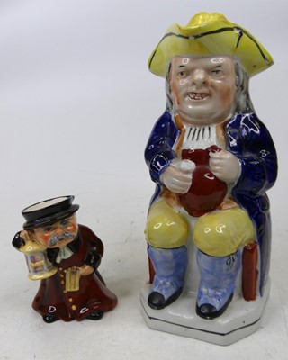 Lot 84 - A Victorian Staffordshire pottery toby jug,...
