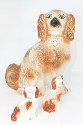 Lot 47 - A Staffordshire pottery figure of a spaniel,...