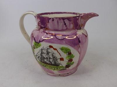 Lot 59 - A Victorian Sunderland lustre jug, decorated...