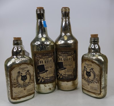 Lot 72 - A pair of mirrored glass advertising bottles,...