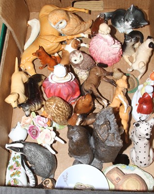 Lot 106 - A collection of ceramic figures of animals to...