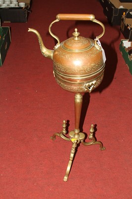 Lot 125 - An Indian copper kettle on stand, having...