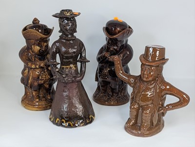 Lot 133 - A John Bull type brown glazed earthenware...