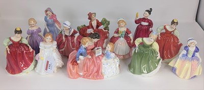 Lot 155 - A collectin of 12 Royal Doulton figures of...