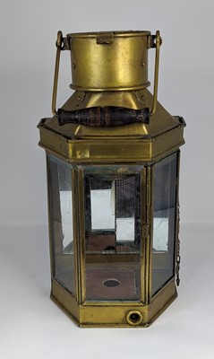 Lot 161 - A vintage brass lantern, having swing handle...