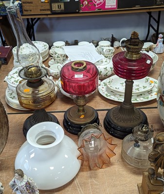 Lot 164 - A collection of Victorian oil lamp parts, to...