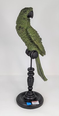 Lot 183 - A green painted composite model of a parrot on...