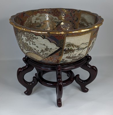 Lot 186 - A Japanese Satsuma pottery bowl, decorated...